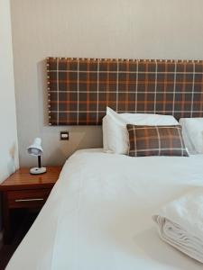 Letto o letti in una camera di Anchor Hotel and Seabed Restaurant