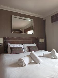 Letto o letti in una camera di Anchor Hotel and Seabed Restaurant