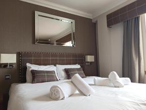 Letto o letti in una camera di Anchor Hotel and Seabed Restaurant