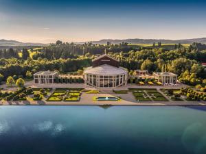 an aerial view of a building next to the water at Ferienwohnung Stephan in Füssen