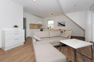 Posezení v ubytování Ferienwohnung Inselstern - Residenz an der Nordseetherme