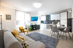 TV a/nebo společenská místnost v ubytování Apartments Filipeti