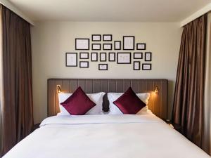 Postel nebo postele na pokoji v ubytování Hotel Am Konzerthaus - MGallery Collection