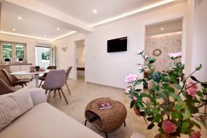 TV a/nebo společenská místnost v ubytování Apartments Jasmina