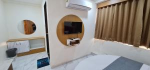 Hotel Vivan客房内的一张或多张床位
