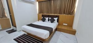 Hotel Vivan客房内的一张或多张床位