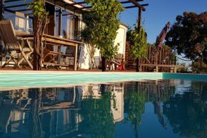 Bazén v ubytování Casa Al Caria nebo v jeho okolí