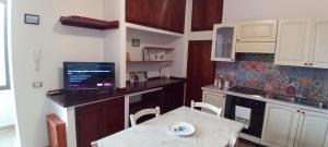 Kuchyň nebo kuchyňský kout v ubytování Casa Gonario