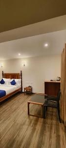 COASTAL GRAND RESORT - KOTAGIRI客房内的一张或多张床位