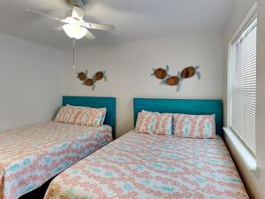 En eller flere senge i et værelse på La Buena Vida