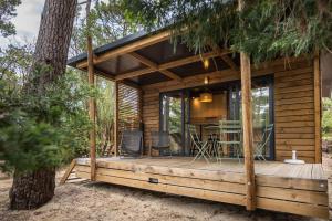 Zahrada ubytování Huttopia Arcachon