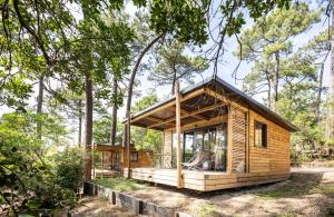 Zahrada ubytování Huttopia Arcachon