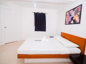 Voodi või voodid majutusasutuse CJS Boracay Joint toas