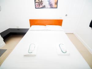 Voodi või voodid majutusasutuse CJS Boracay Joint toas