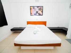 Voodi või voodid majutusasutuse CJS Boracay Joint toas