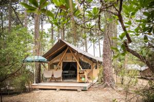 Zahrada ubytování Huttopia Arcachon