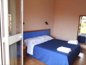 Postel nebo postele na pokoji v ubytování La Feluca