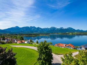 a view of a lake with mountains in the background at Vitusfort Doppelzimmer Loch Ness in Füssen