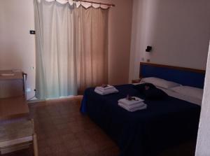 Postel nebo postele na pokoji v ubytování La Feluca