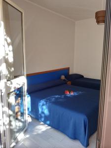 Postel nebo postele na pokoji v ubytování La Feluca