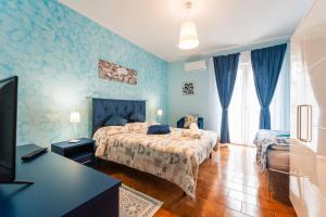 Posteľ alebo postele v izbe v ubytovaní La casa di Sofia