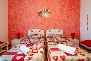 Posteľ alebo postele v izbe v ubytovaní La casa di Sofia