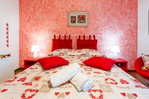 Posteľ alebo postele v izbe v ubytovaní La casa di Sofia
