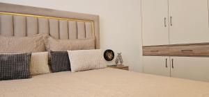 Postel nebo postele na pokoji v ubytování Value Living Apartment