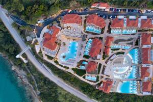 an aerial view of a resort with a pool at Cora Hotel & Spa in Afitos