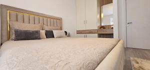 Postel nebo postele na pokoji v ubytování Value Living Apartment