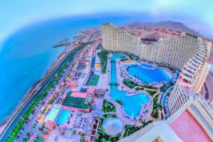 an aerial view of a resort on the beach at Porto Sokhna Pyramids Apartments in Ain Sokhna