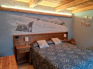Postel nebo postele na pokoji v ubytování L'Abreny