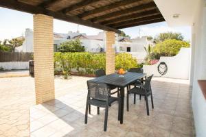 A patio or other outdoor area at Eusebio - Casa en Riumar para 4 personas y en primera línia de mar - Deltavacaciones