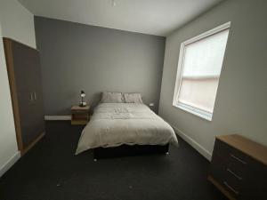 Llit o llits en una habitació de OYO Arcadia By Habitat101