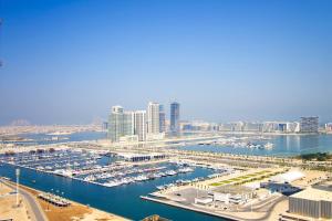 a marina with a bunch of boats in the water at Modern Sea View 1Bedroom Dubai Marina in Dubai