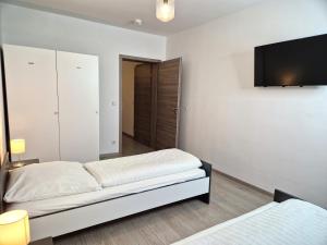 Postel nebo postele na pokoji v ubytování Meribu G31 Wohnung für Monteure und Arbeiter