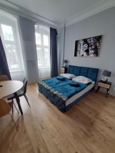 Postel nebo postele na pokoji v ubytování Grunwaldzki24 Apartments - FREE PARKING - OLD TOWN, CENTRUM