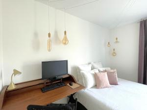 Televízia a/alebo spoločenská miestnosť v ubytovaní Alba DeLuxe - 3 Bedroom Pointe Croisette, by Welcome to Cannes