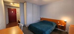 Katil atau katil-katil dalam bilik di Hotel Lyon Sud, Pierre Benite, St Genis Laval