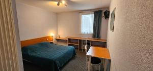 Katil atau katil-katil dalam bilik di Hotel Lyon Sud, Pierre Benite, St Genis Laval