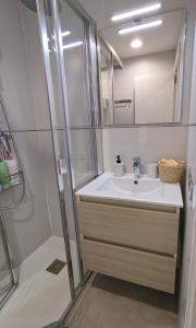 a bathroom with a sink and a shower at APARTAMENTO LA UNIÓN in Castellón de la Plana +55 photos
