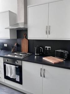 Virtuvė arba virtuvėlė apgyvendinimo įstaigoje Guest Homes - Driffield Apartment