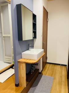 Phòng tắm tại 難波心斎橋10minutes民宿2号室