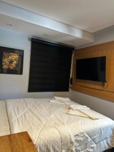 Cama ou camas em um quarto em Hotel La Serena