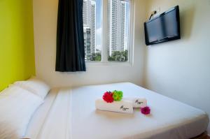 Postel nebo postele na pokoji v ubytování Fragrance Hotel - Classic