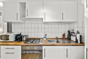 Kuchyň nebo kuchyňský kout v ubytování primeflats - Apartment Leberstr 58 Berlin Schöneberg