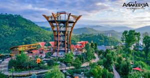 a resort with a tower in the middle of a mountain at Corner Unit Balcony Free Tix Gatlinburg in Gatlinburg +15 photos