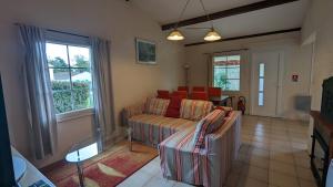 Posezení v ubytování Etang Vallier Resort Brossac