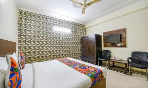 Postel nebo postele na pokoji v ubytování Hotel Smart Stay