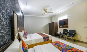 Postel nebo postele na pokoji v ubytování Hotel Smart Stay